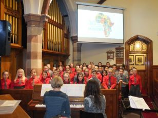 Omagh County Choir sing with the African Children's Choir